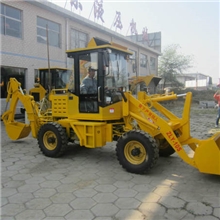 挖掘装载机，两头忙