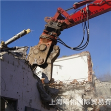 用于挖掘机的进口切割破碎器，它是处理钢筋混凝土结构的理想选择