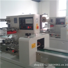 供应自动湿巾包装机，自动月饼面包包装机，块状药品包装机