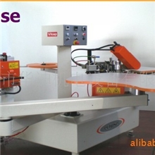 办公家具机械圆桌机械三聚氢胺家具机械意大利自动曲线封边机