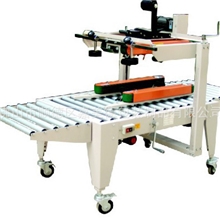 供应自动胶带封箱机左右上驱动封箱机胶带封箱机