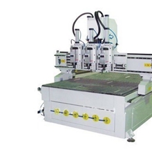 青岛雕刻机青岛木工雕刻机青岛气动换刀木门雕刻机