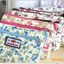 G64韩版时尚休闲包可爱多功能时尚碎花手机包零钱包两用0.035