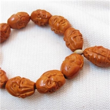 批发供应橄榄核北工橄榄核雕十八罗汉双面雕手串