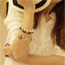 义乌韩国手饰厂家批发时尚四叶草滴油多层珍珠皮绳情侣手链女