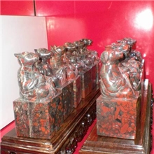 批发订做鸡血红梅玉手工雕件兽首摆件