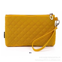 厂家供应红色间棉时尚化妆包带手挽