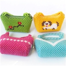 厂价供应珍珠包珍珠工艺元宝造型提包