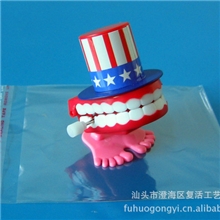 戴礼帽.带美国帽上链跳跳牙厂家直销7294万圣节儿童塑料玩具