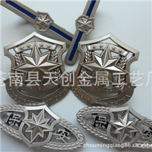 专业供应2011年新款统一保安帽徽金属全套胸牌保安领带夹帽徽