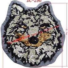 供应珠片服装贴饰、流行T恤印花、中性狼头珠片饰品