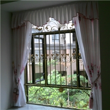 吉利豪门铁艺厂专业设计生产安装铁艺防盗窗窗花等各类铁艺制品