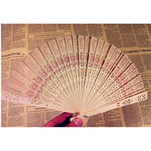 A002批发供应镂空香木扇子优质折扇工艺扇子礼品扇散装