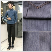 广州牛仔布厂家天丝竹节牛仔面料77093%斜纹竹节牛仔布