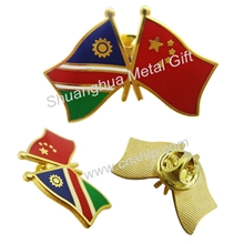 专业生产、低价供应国旗胸章，国旗徽章（可按设计定制各种工艺）