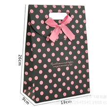工厂直销黑点粉点蝴蝶结粘扣纸制礼品手提袋中号现货可混批