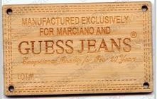 服装吊牌。镭射木雕吊牌