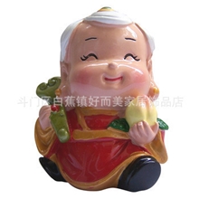 供应订做树脂挑水情侣，和尚，公仔，武功小子，小财神，球星