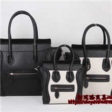 笑脸包真皮囧包囧字包囧脸包大号中号小号黑白牛皮笑脸包