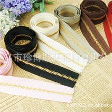 【义乌珍博】现货供应码装5号金色牙齿金属拉链,价格优惠