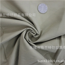 供应2014年新款32s*100d/133*862/1斜纹棉锦交织裤子面料