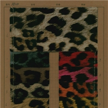 供应：PU皮革0.9厚仿真皮高光镜面大豹纹手袋箱包革