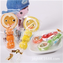 12.5克妞妞软糖棒棒糖批发笑脸开心球