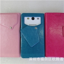 批发吸盘万能皮套厂家直销万能吸盘皮套适用5.0-5.5寸手机