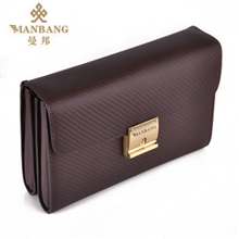 正品牛皮男包高档豪华男手包手拿包重量级顶级密码锁手抓包