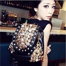 2013新款夏季爆款韩版纽扣手提单肩斜跨双背流苏女包厂家直销