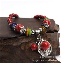 供应新款民族风纯手工编织手链藏银铜钱松石贝壳手编民族手链