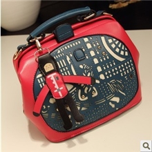 2013撞色手提单肩女包卡通可爱带附件人物四色可选亿辉箱包T213