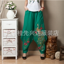 春季新款松紧腰长裤民族风绣花孔雀裤子裤脚瘦腿带拉链阔腿女裤